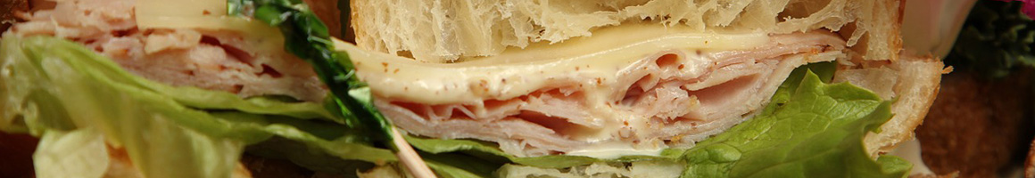 Eating Sandwich Cafe at Commons Cafe restaurant in Bellevue, WA.